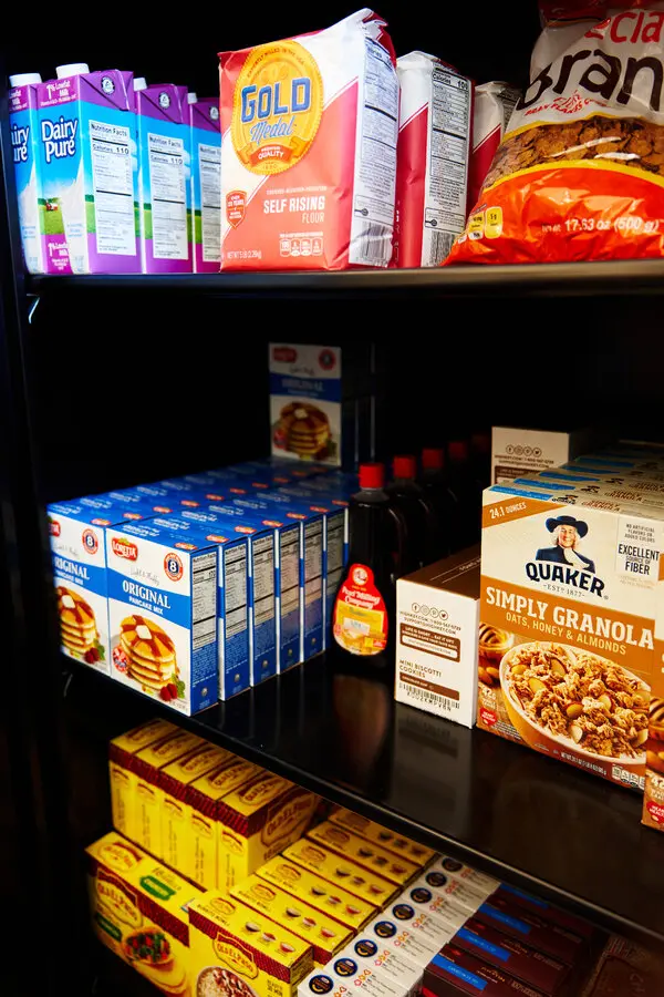 The pantry at the Dr. Michael D. Fox elementary school is available for students and families who need items at home (Ike Abakah for The New York Times).