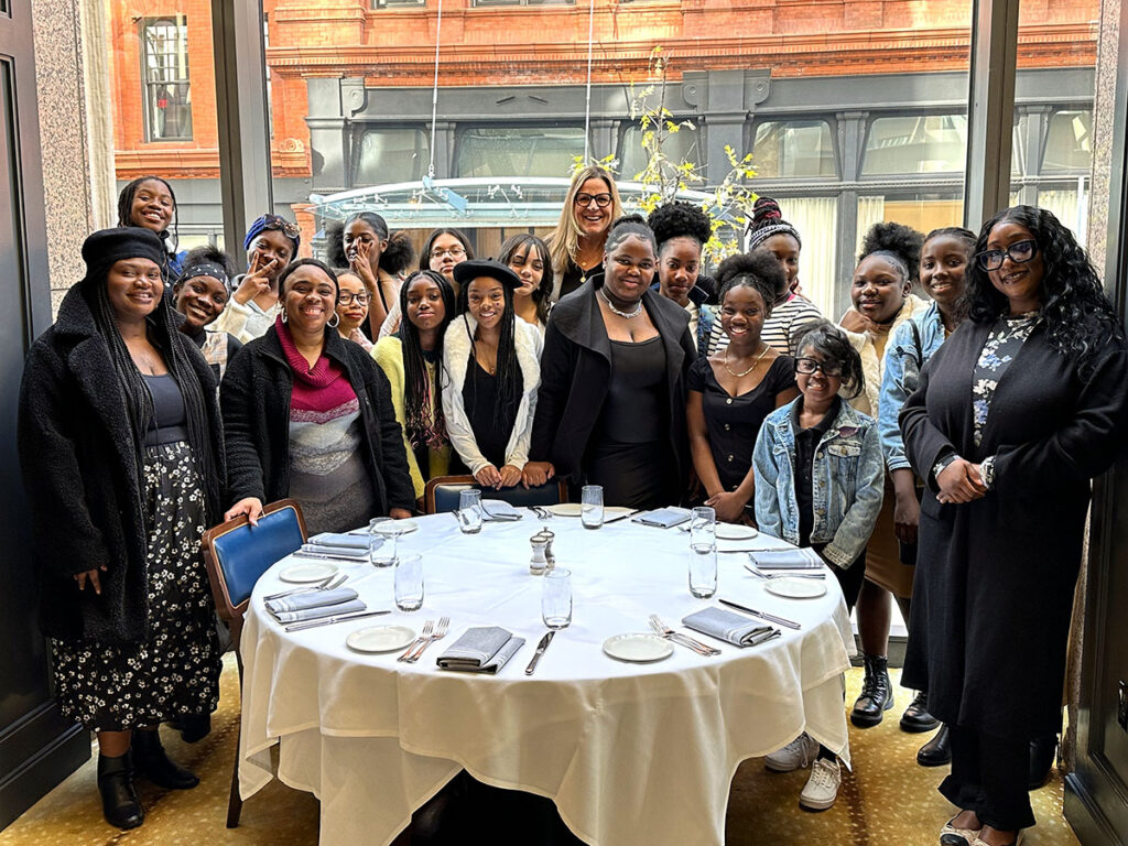 The Sisterhood Group enjoys an outing at an upscale restaurant.