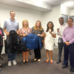 The Cigna Group raised over 100 coats and hand painted adorable rubber duck toys for children we serve.