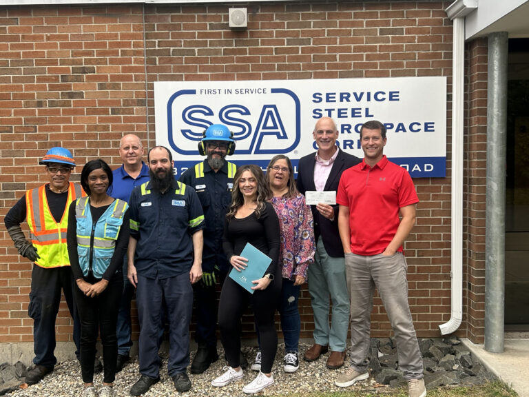 Service Steel Aerospace Corp. donated $10,000 to The Village to support services that help children and families in their community.